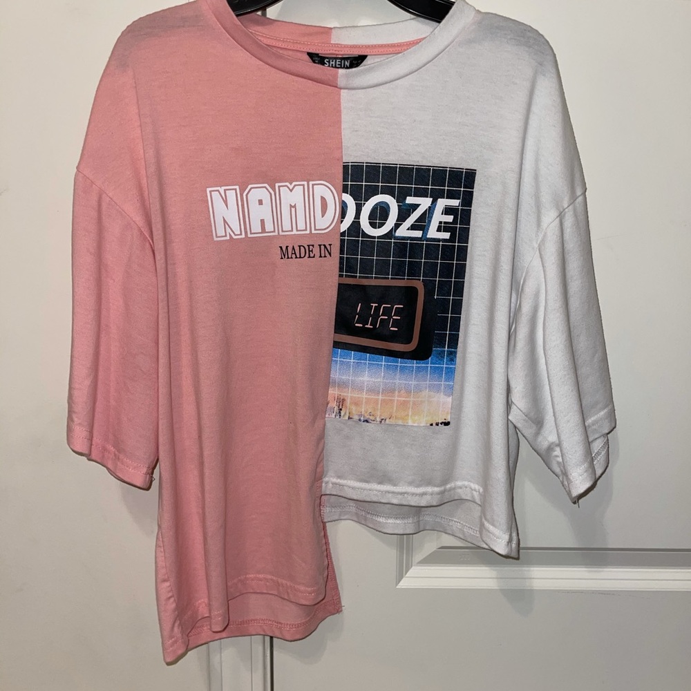 pink and white shirt, made with one side longer.